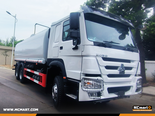 Papua New Guinea - 4 Units SHACMAN SX3255DT385R Dump Trucks & 1 HOWO ZZ1257N4647B1R Sprinkler & 1 ZZ1107G4515C1R Oil Tanker