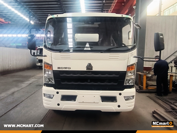 Papua New Guinea - 4 Units SHACMAN SX3255DT385R Dump Trucks & 1 HOWO ZZ1257N4647B1R Sprinkler & 1 ZZ1107G4515C1R Oil Tanker